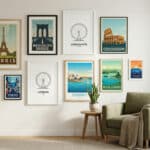 Modern living room with a curated gallery wall of framed city travel posters. An armchair and plant sit by a bright window.